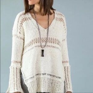 Like New Free People loose knit distressed sweater size small